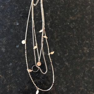 Triple chain gold necklace